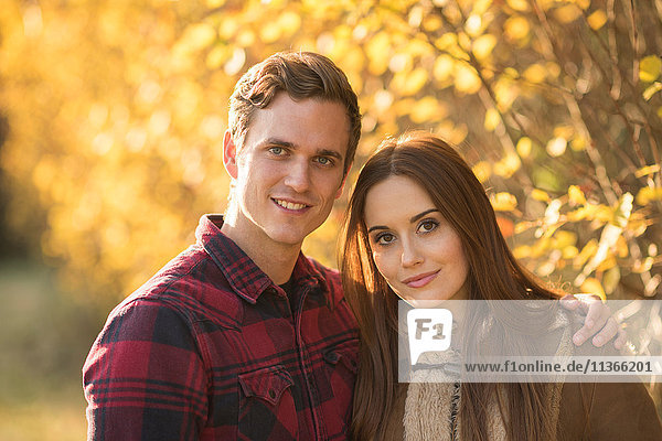 Portrait of young couple in rural setting