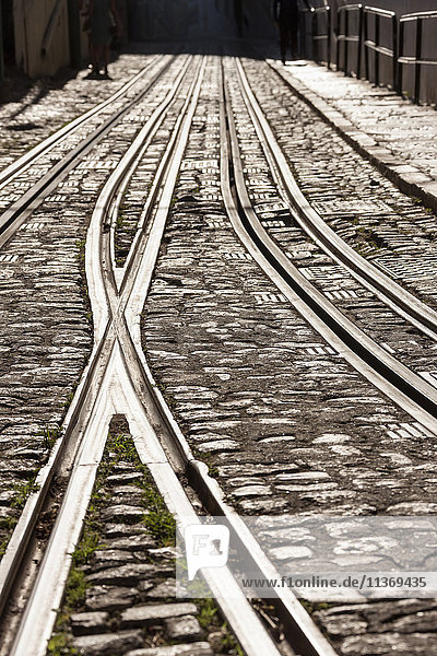 Railroad tracks on city street  Lisbon  Portugal