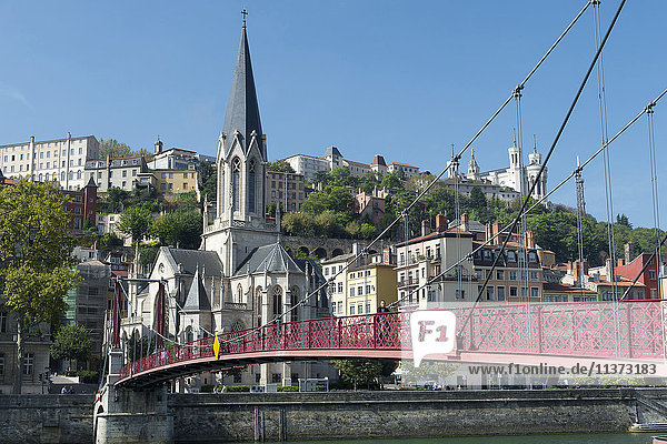 France. Lyon. The footbridge Paul Couturier (also called footbridge Saint-Georges)(1853) on the Saone and Saint-Georges church