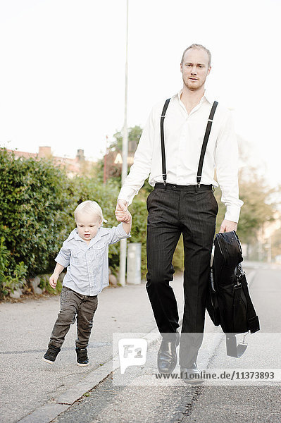 Father walking with son