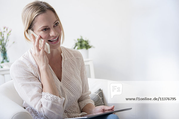 Caucasian woman talking on cell phone
