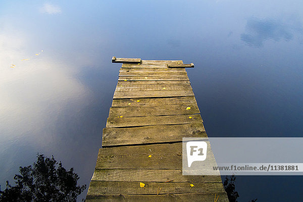 Dock over still lake
