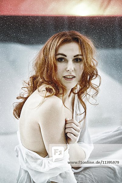 Redhead maiden woman  portrait  snowy setting