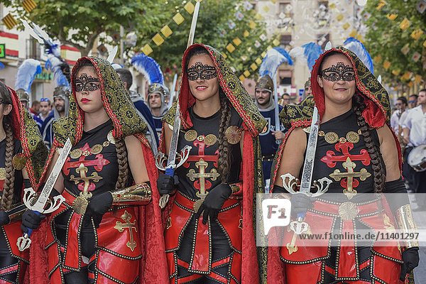 Women in historic clothing  Moors and Christians Parade  Moros y Cristianos  Jijona or Xixona  Province of Alicante  Costa Blanca  Spain  Europe