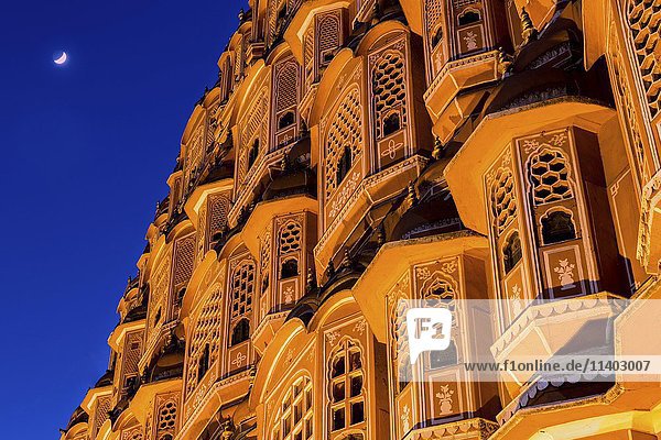 Facade of the Hawa Mahal  Palace of the Winds  at dusk with the moon  Jaipur  Rajasthan  India  Asia