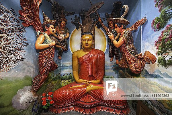 Buddha statue  sitting  Weherahena Temple  Matara  Southern Province  Sri Lanka  Asia