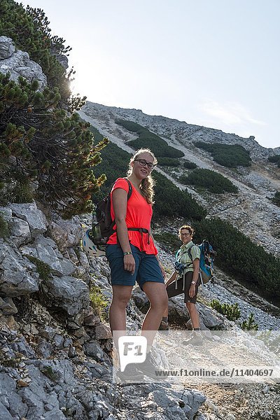Two female hikers on trail  Mittenwalder Höhenweg  Karwendel  Mittenwald  Germany  Europe