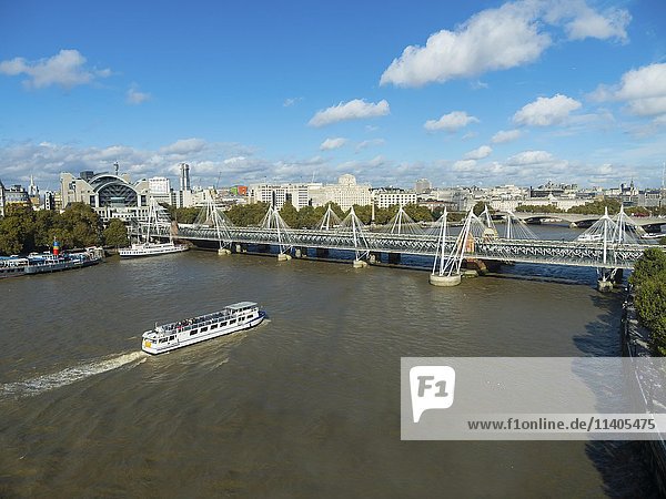 River Thames  boat  Hungerford Bridge  London  England  United Kingdom  Europe