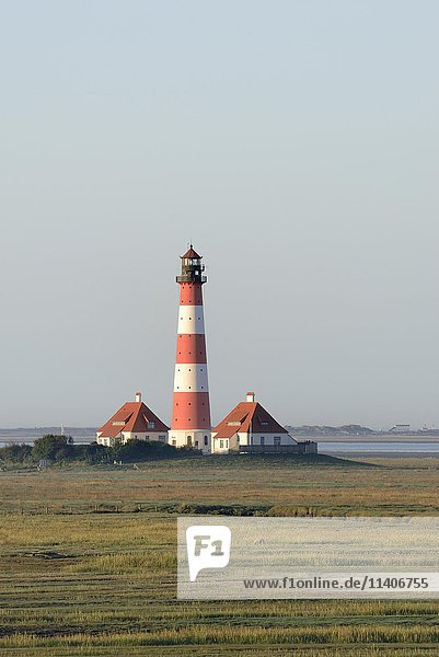 Lighthouse Westerhever in salt marshes  Westerheversand  Schleswig-Holstein Wadden Sea National Park  North Frisia  Schleswig-Holstein  Germany  Europe