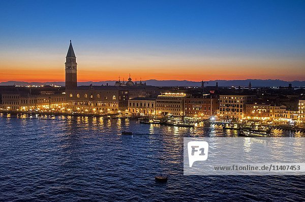View from San Marco Basin  Bacino di San Marco  sunset  Piazza San Marco with Campanile and Doge's Palace  Palazzo Ducale  Venice  Italy  Europe
