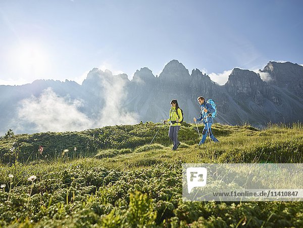 Hikers in mountains  Kalkkögel  Kemater Alm  Tyrol  Austria  Europe
