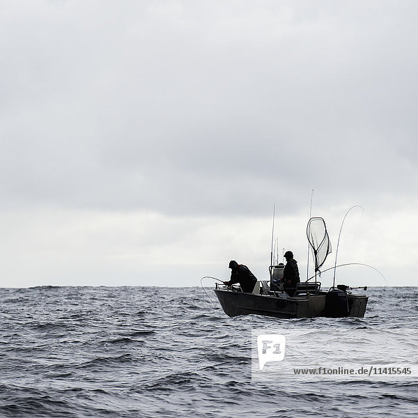 'Fishing from a fishing boat off the Queen Charlotte Islands; British Columbia  Canada'