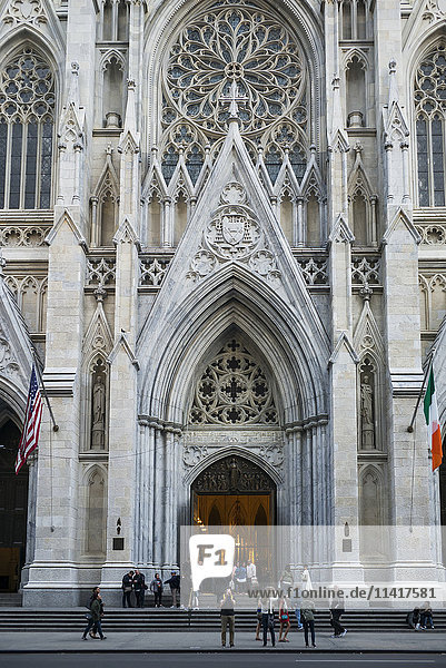 'Tourists outside Saint Patrick's Cathedral; New York City  New York  United States of America'