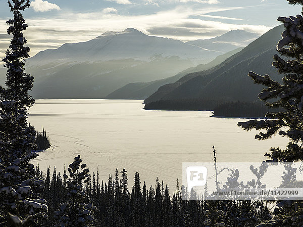 'Frozen Muncho Lake in winter  Muncho Lake Provincial Park; British Columbia  Canada'