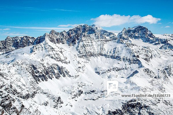 Aerial view of the Bernina Group in its winter version with the Sasso d'Entova and Pizzo Tremogge in the foreground and the Pizzo Bernina in the background  Valmalenco  Valtellina  Italy.
