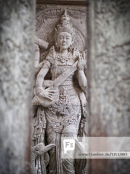 Temple carving  Ubud  Bali  Indonesia  Southeast Asia  Asia