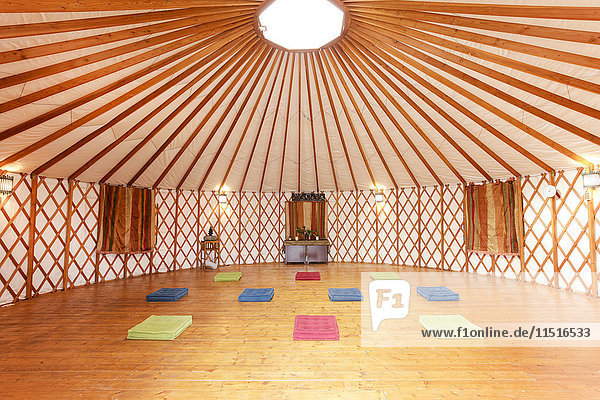 Exercise mats in empty yurt