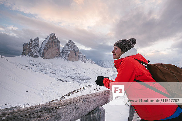 Female hiker looking at view  Tre Cime di Lavaredo area  South Tyrol  Dolomite Alps  Italy