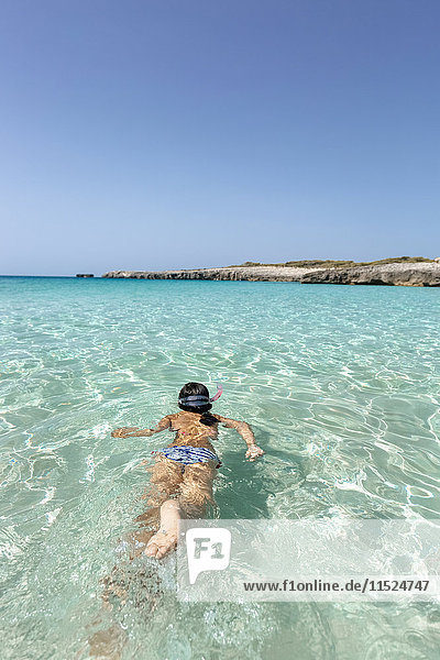 Spain  Menorca  Talaier Beach  girl snorkeling