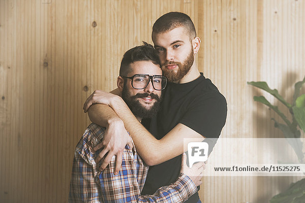 Portrait of young gay couple