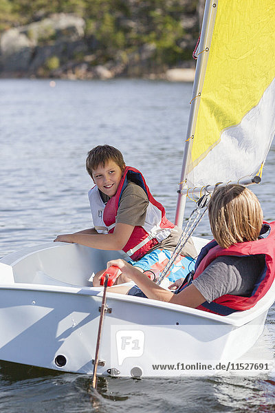 Children on sailing boat