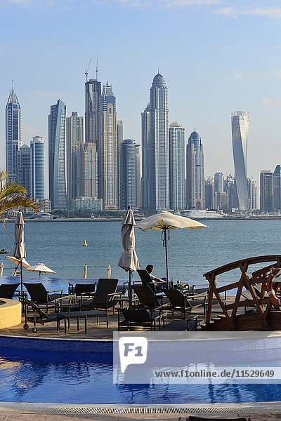United Arab Emirates  Dubai  Oceana swimming pool  the Palm Jumeirah and the skyscraper skyline