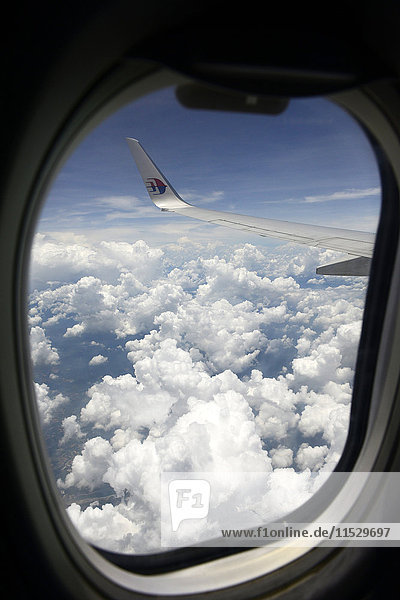 South-East Asia  Malaysia  view of a plane wing through a plane window