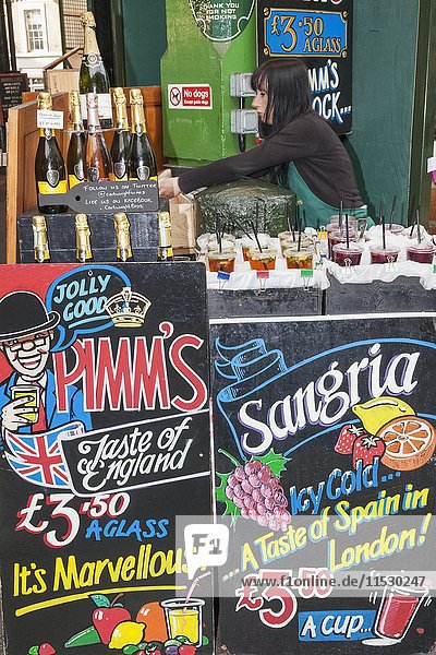 England  London  Southwark  Borough Market  Wine Shop  Pimm's and Sangria Advertising Boards