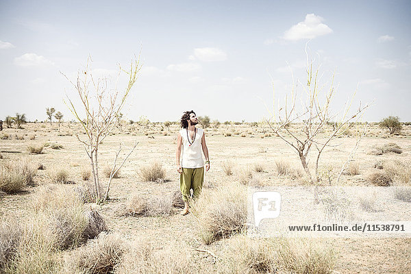 Man standing alone in the desert