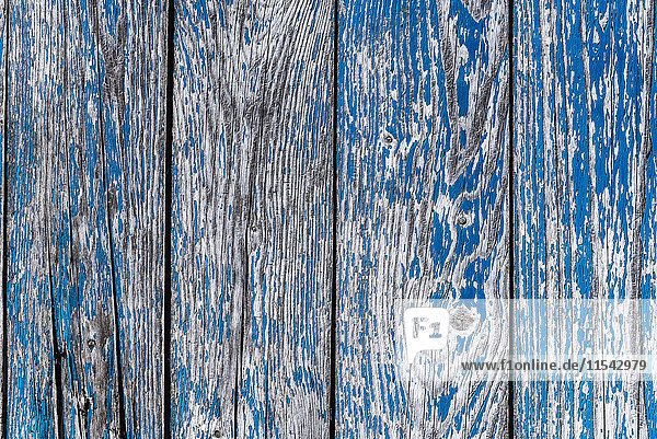 Bars with flaking blue colour close-up