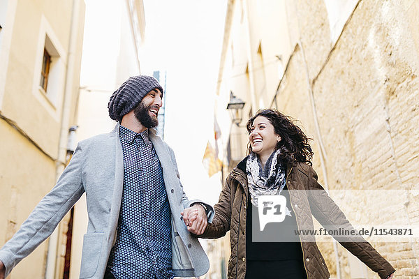 Spain  Tarragona  city break  young couple smiling