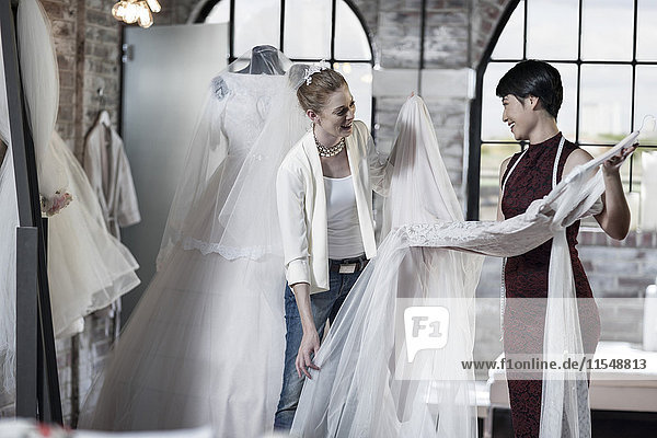 Wedding dress designer and bride to be