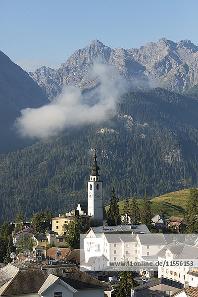 Blue sky on the alpine village of Ftan surrounded by rocky peaks  Inn district  Canton of Graubunden  Engadine  Switzerland  Europe