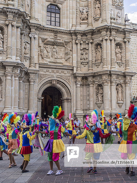 Masked dancers  Fiesta de la Virgen de la Soledad  Basilica of Our Lady of Solitude  Oaxaca  Mexico  North America