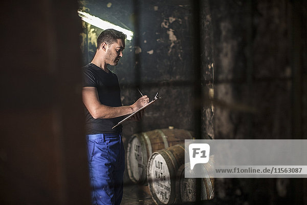 Worker working in distillery