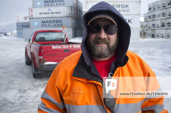 Longshoreman working in Horizon Lines container yard in Unalaska  Southwest Alaska  USA