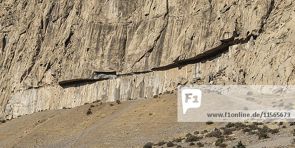 'Farhad Tarash chiseled rock; Bisotun  Kermanshah Province  Iran'