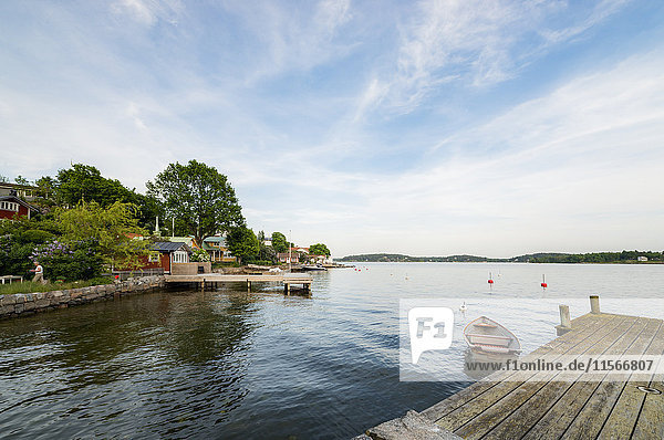 Sweden Stockholm Archipelago Uppland Vaxholm Rowboat moored to pier