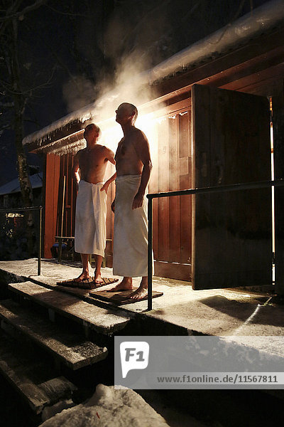 Two men after bath in sauna