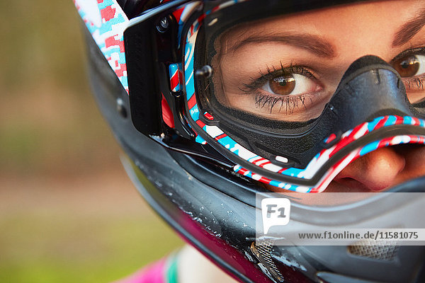 Close up portrait of female BMX rider in crash helmet