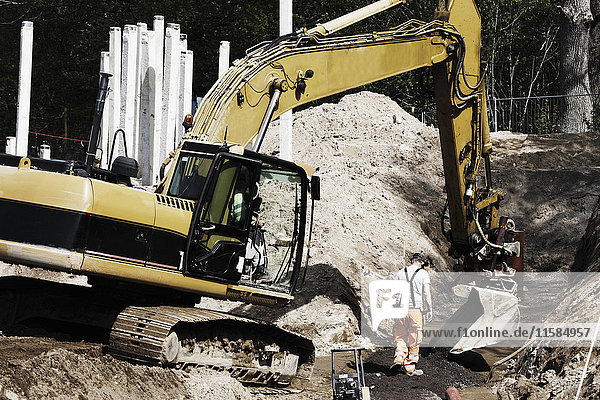 Erdbewegungsmaschine auf der Baustelle.