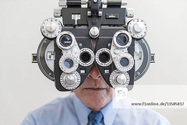 Man having his eyes tested.