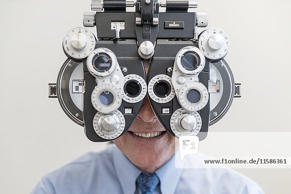 Man having his eyes tested.