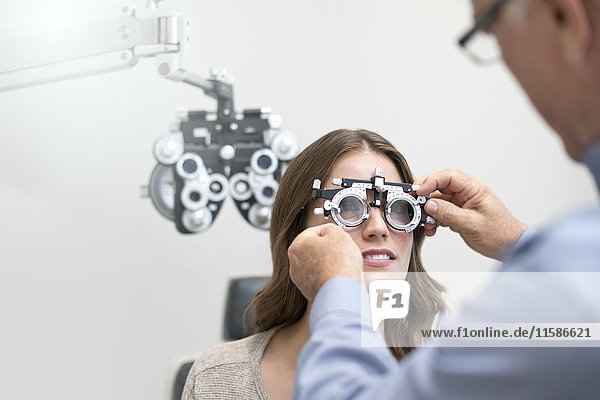 Woman wearing eyesight testing spectacles.