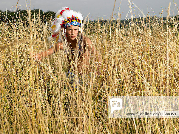 Boy dressed up as north american indian