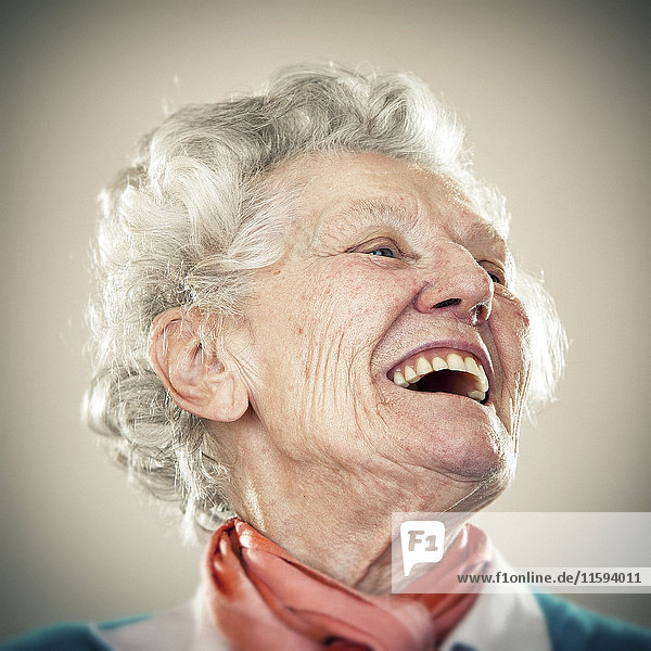 Portrait of an elderly lady  laughing out loud