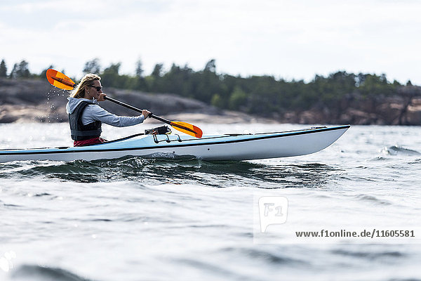 Woman kayaking