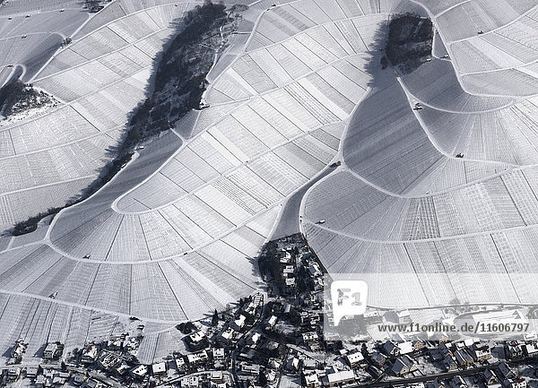 Aerial view of town by snow covered agricultural fields  Hohenheim  Stuttgart  Baden-Wuerttemberg