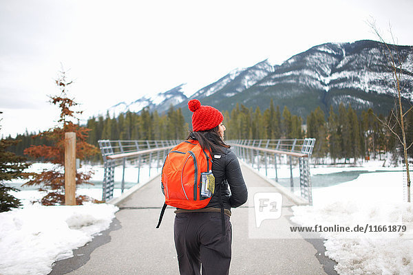 Hiker hiking to snow capped mountain  Banff  Canada