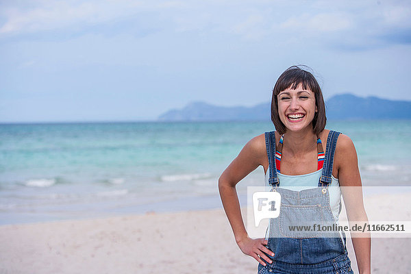 Woman laughing on the beach  Mallorca  Spain